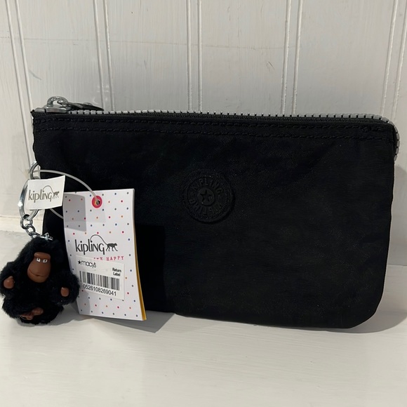 Kipling Bags Kipling Clutch Bag Blacknwt Poshmark